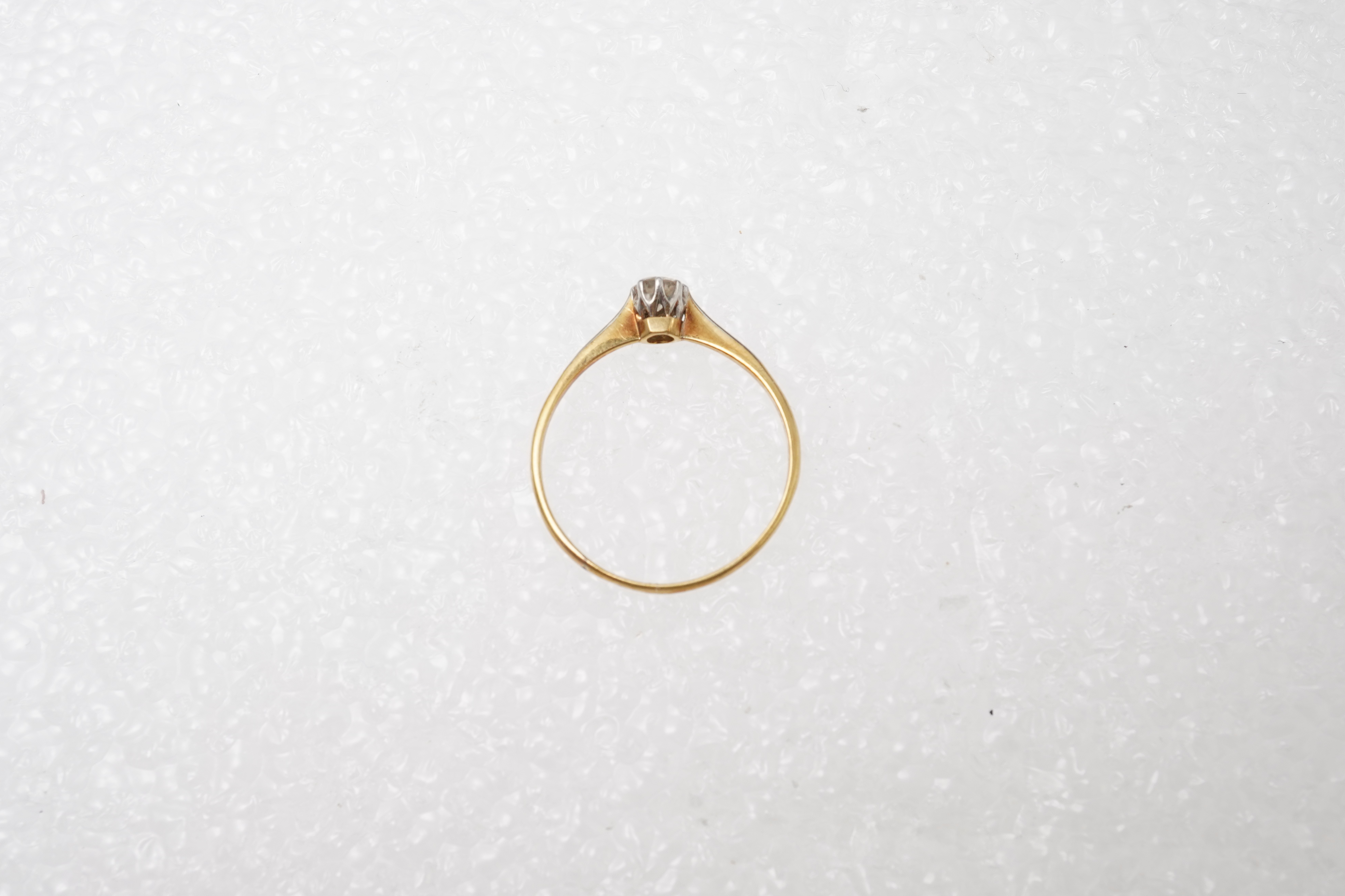 A small solitaire diamond ring, early 20th century